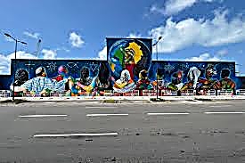 Fresque d'Eduardo Kobra sur le mur du Port Autonome de Cotonou — dialogue interreligieux (2023)